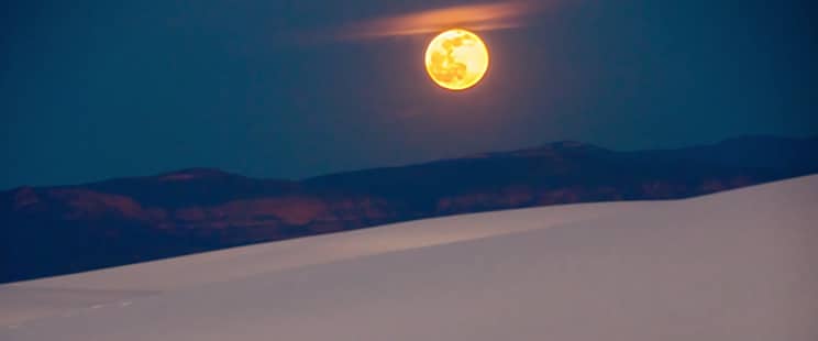 full moon over desert